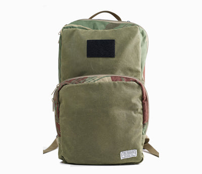 Old Enfield Supply Camo Backpack. Veteran Made Backpack. Wax Canvas Backpack. Waxed Canvas Backpack. Canvas Backpack. Rhodesian Brushstroke Camo Garrison Backpack. Rhodesian Brushstroke Backpack. Camo Backpack.